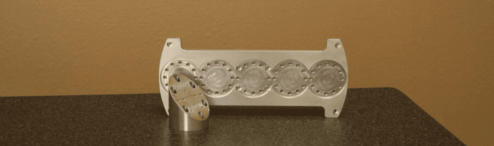 Machined aluminum component by Gibbs Precision Machine